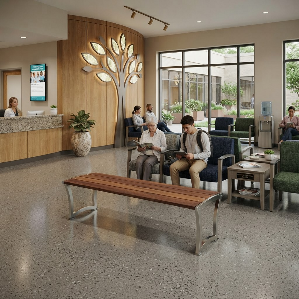 A modern waiting-area lobby with a long wooden bench in the foreground, upholstered seating with people sitting nearby, a reception desk, and large windows in the background.