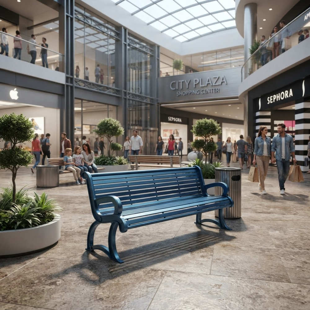 A blue wooden park bench is placed in a modern shopping mall atrium with people walking and sitting nearby, with visible Sephora and City Plaza signage in the background.
