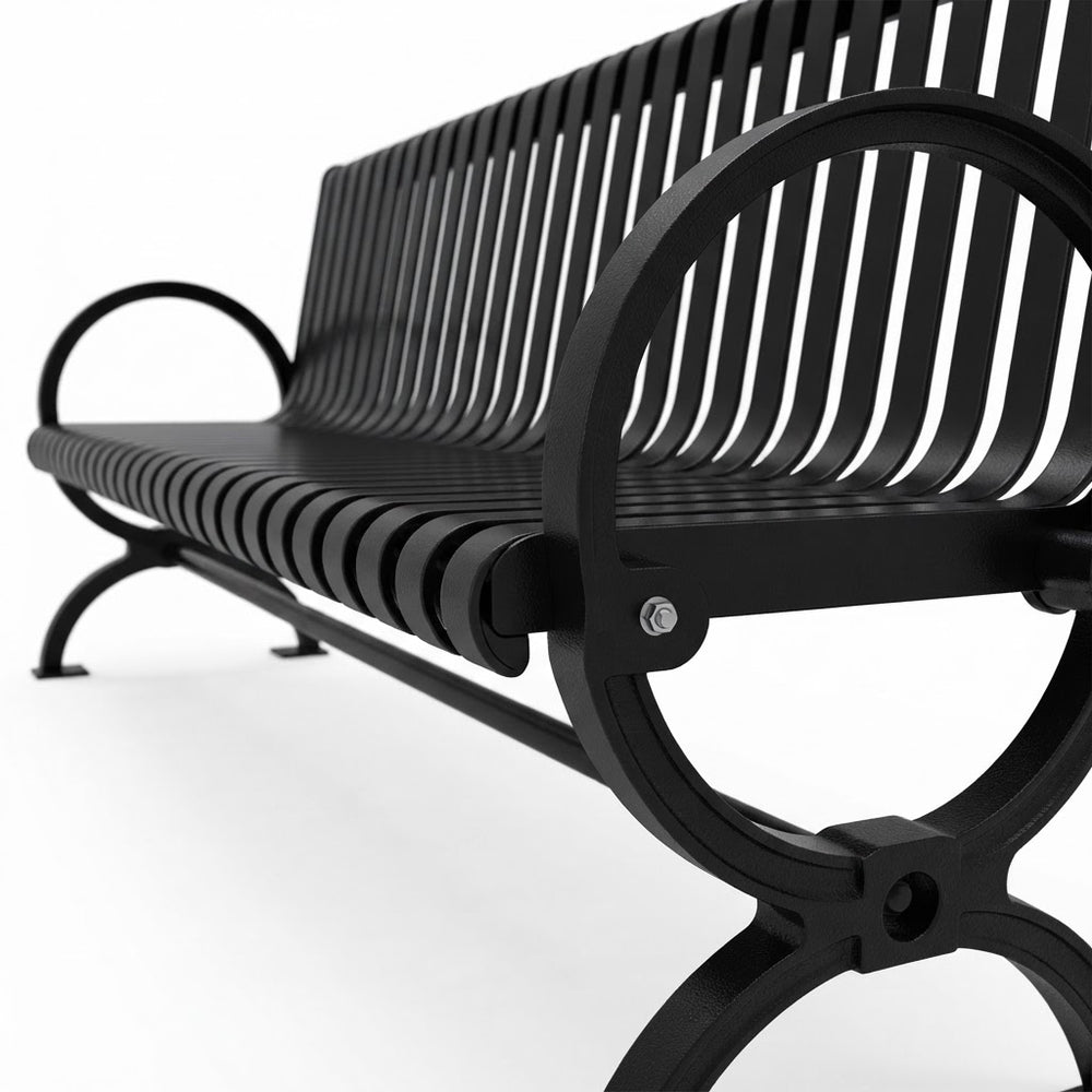 A close-up studio shot of a black metal park bench with a slatted back and seat, featuring decorative curved armrests and legs on a white background.