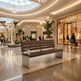 A modern wooden slat bench with silver metal supports sits in a luxury shopping mall atrium, with a Bvlgari store visible in the background.