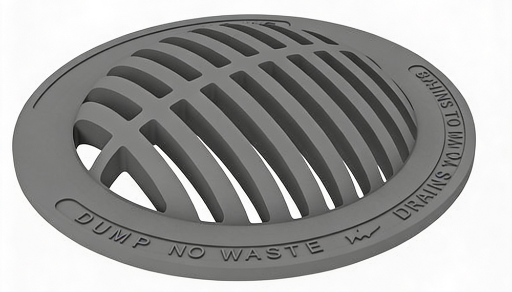 Round gray cast iron manhole cover with a grid pattern and text inscription.