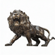 Dynamic bronze lion statue with open mouth, detailed teeth, and expressive muscular form