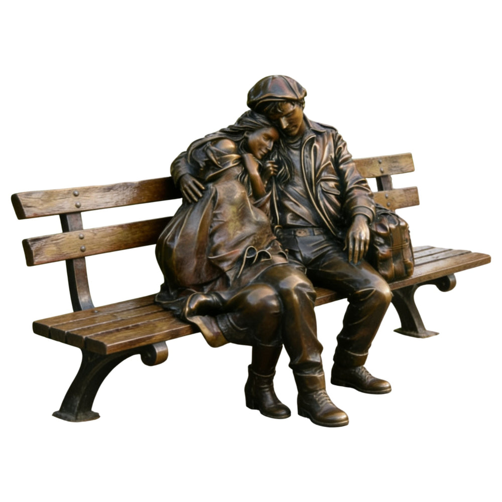 Bronze sculpture of two people sitting on a bench