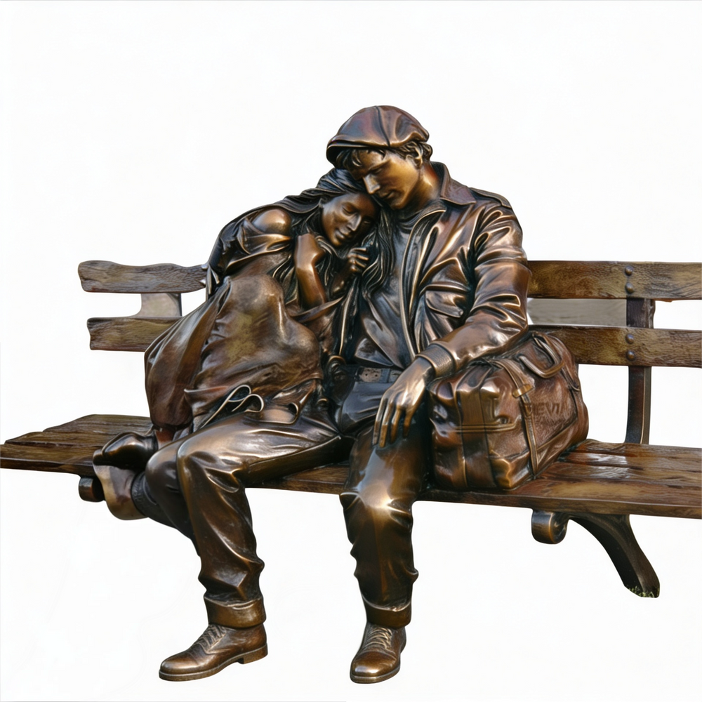 Bronze sculpture of two people sitting on a bench