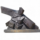Dark metal geometric abstract sculpture with angular intersecting forms on a rectangular base.