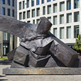 Textured metallic sculpture featuring sharp planes and dynamic modern abstract shapes