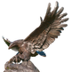 Bronze sculpture of an eagle with outstretched wings on a white background