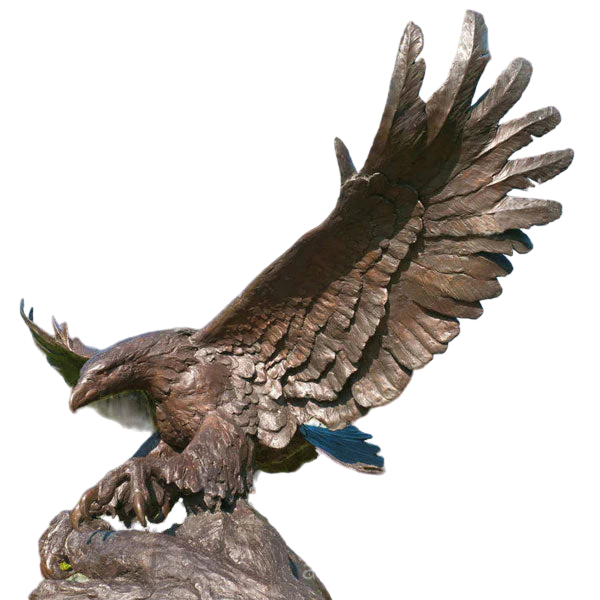 Bronze sculpture of an eagle with outstretched wings on a white background