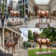 Collage of a large bronze moose sculpture in various settings including a city street, museum, and park.
Public plazas, cultural centers, and community installations