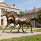 Dynamic bronze horse figures captured mid‑gallop, emphasizing strength and elegance
