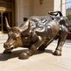 Bronze bull statue in front of a building
Modern bronze‑finish bull artwork symbolizing strength and momentum