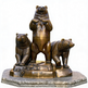 Bronze statue of three bears on a white background