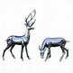 Two metallic deer figurines on a white background
Reflective metallic deer statues with modern mirror‑finish surfaces
