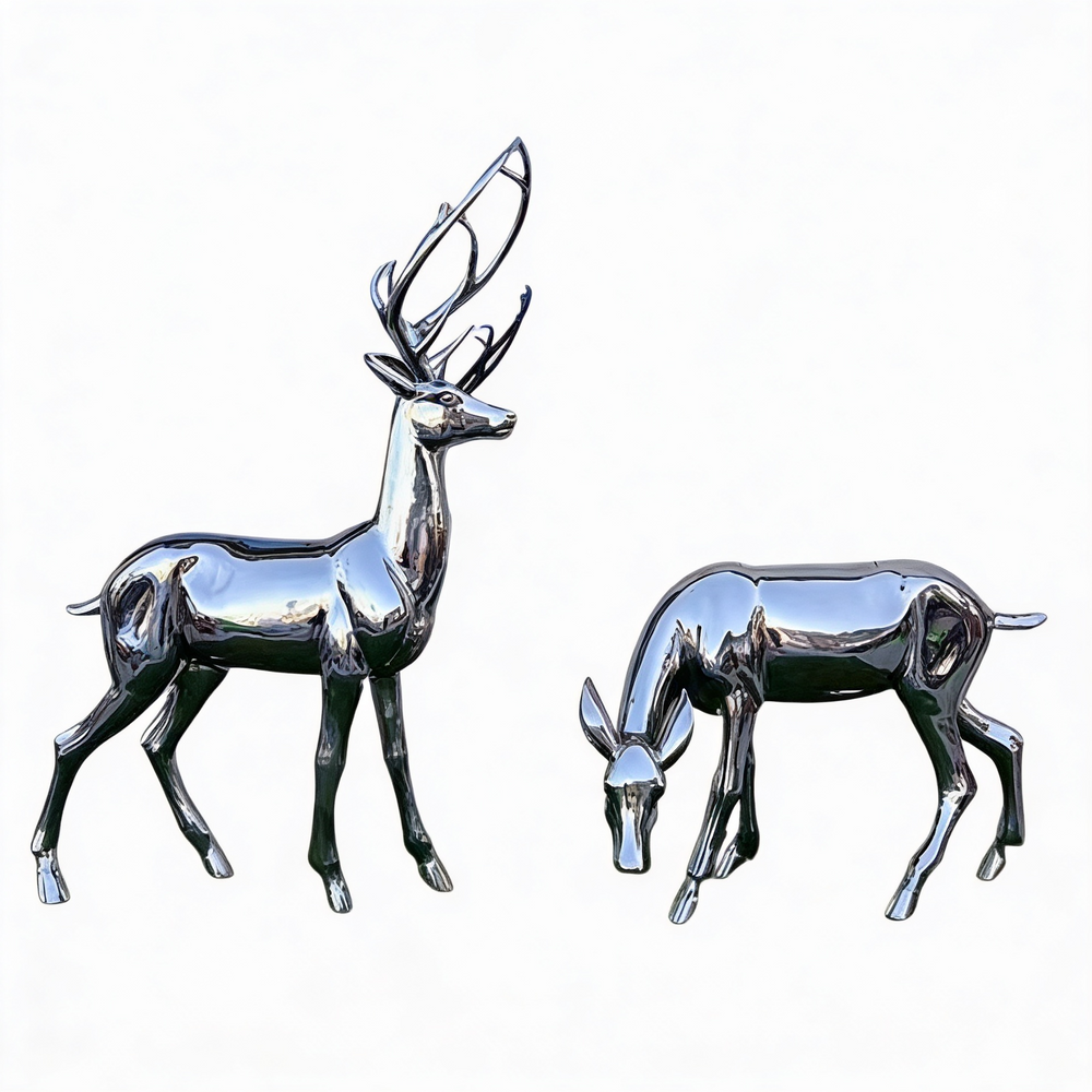 Two metallic deer figurines on a white background
Reflective metallic deer statues with modern mirror‑finish surfaces
