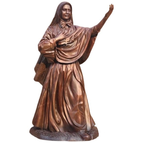 Bronze statue of a religious figure with outstretched arm on a white background
Bronze Mother Cabrini statue with outstretched hand and detailed religious robe