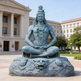 Statue of a seated figure with a lion at its feet in front of a building
Detailed bronze sculpture of Lord Shiva in a calm meditation pose