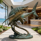 Bronze shark sculpture in a modern outdoor setting with a view of the 
ocean.
Bronze sculpture of two sharks swimming through stylized waves
