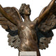 Bronze statue of an angel with outstretched wings on a white background