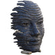 Statue of a face with textured skin and a neutral expression on a white background