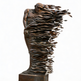 Bronze sculpture of a figure with flowing, leaf-like extensions on a white background
Lifesize bronze figure with one side dissolving into layered ribbons