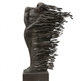 Bronze sculpture of a figure with flowing wings on a white background
Lifesize bronze dissolving human figure sculpture with flowing layered form