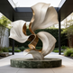 Modern sculpture with wavy design on a stone base in an outdoor setting