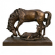 Bronze sculpture of two horses on a white background