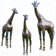 Three metallic giraffe sculptures on a white background
Polished metal giraffe sculpture set with tall, medium, and small figures