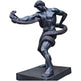 Statue of a muscular figure holding a snake on a white background