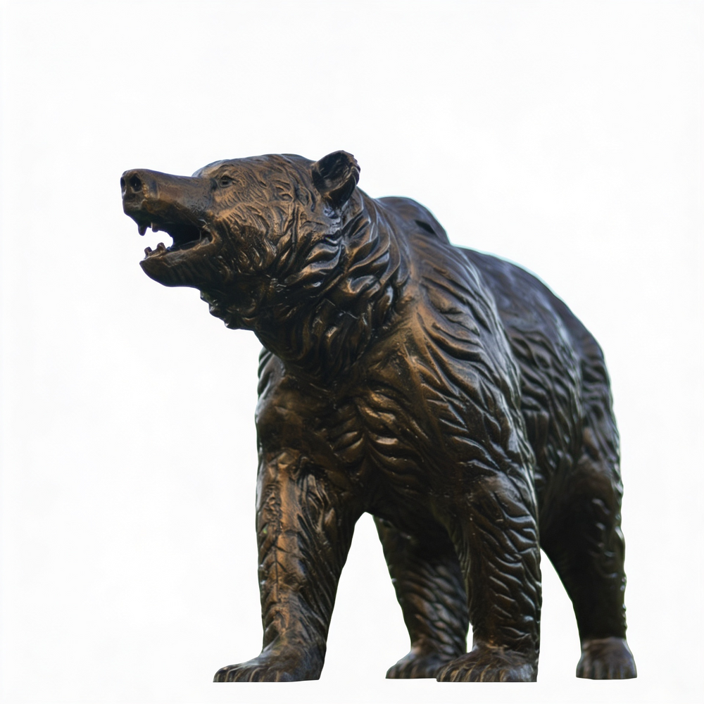 Bronze bear statue on a white background