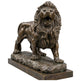 Bronze lion statue on a white background