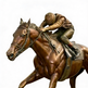 Bronze statue of a horse and jockey on a white background