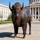 Realistic bronze bison artwork capturing strength and natural movement