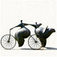 Bronze sculpture of two figures on a bicycle against a white background