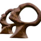 Bronze sculpture of two intertwined figures on a white background