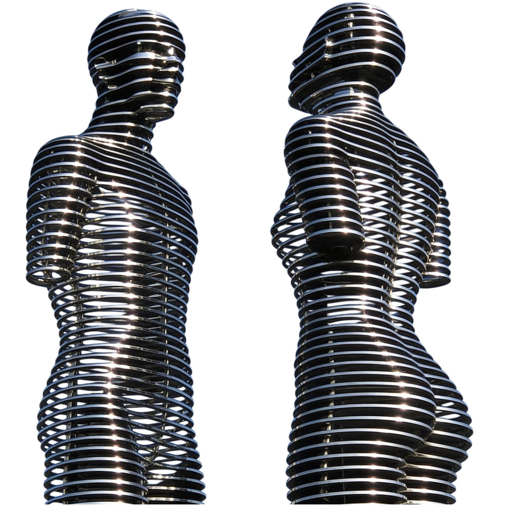 Metal Ring‑Layer Human Figures Sculpture with Modern Geometric Design