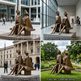 Bronze sculpture of two figures on a bench in various settings including a town square, museum atrium, government building, and public park.
Bronze abstract duo sculpture with sharp edges and origami‑like design