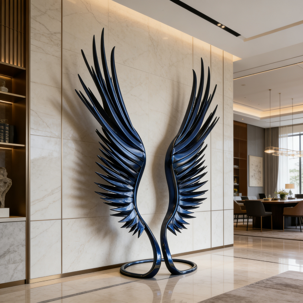 Decorative sculpture of large blue wings on a wall in a modern interior setting.