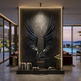 Decorative wall sculpture of wings in a modern living room with large windows.