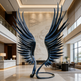 Large sculpture of a bird with outstretched wings in a modern indoor setting