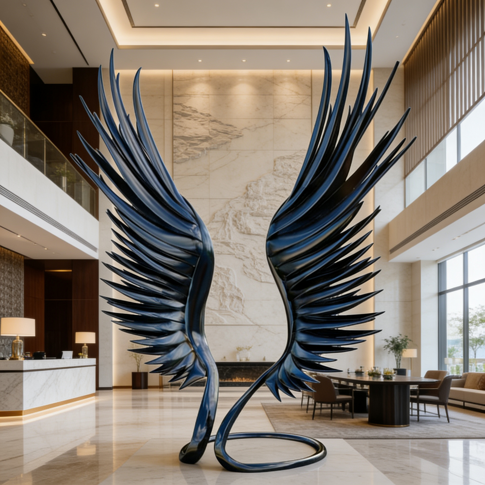 Large sculpture of a bird with outstretched wings in a modern indoor setting