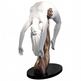 Expressive sculpture of a bronze arm elevating a smooth white figure, symbolizing support and motion