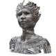 Metallic sculpture of a face with wavy patterns on a white background