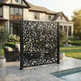 Outdoor decorative privacy wall featuring contemporary pebble cutouts