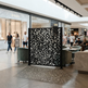 Decorative laser cut privacy panel featuring abstract pebble pattern