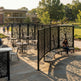 Outdoor garden privacy screen featuring detailed tree and leaf artwork