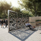 Custom metal privacy divider featuring intricate leaf and branch details