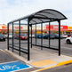 Outdoor installation of TAIMCO shopping cart shelter providing weather protection for grocery carts.