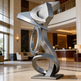 Modern silver sculpture in a luxurious interior setting