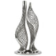 Silver decorative sculpture with intricate design on a white background